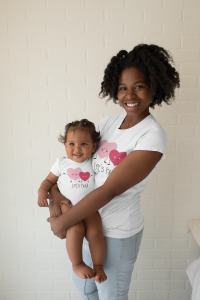 t-shirt-mockup-featuring-a-woman-holding-her-baby-28065